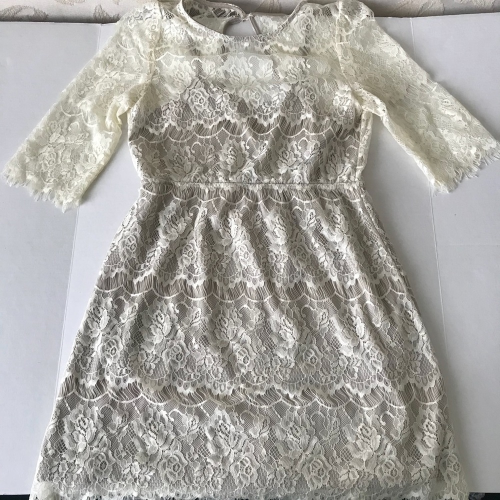 tan and white lace dress